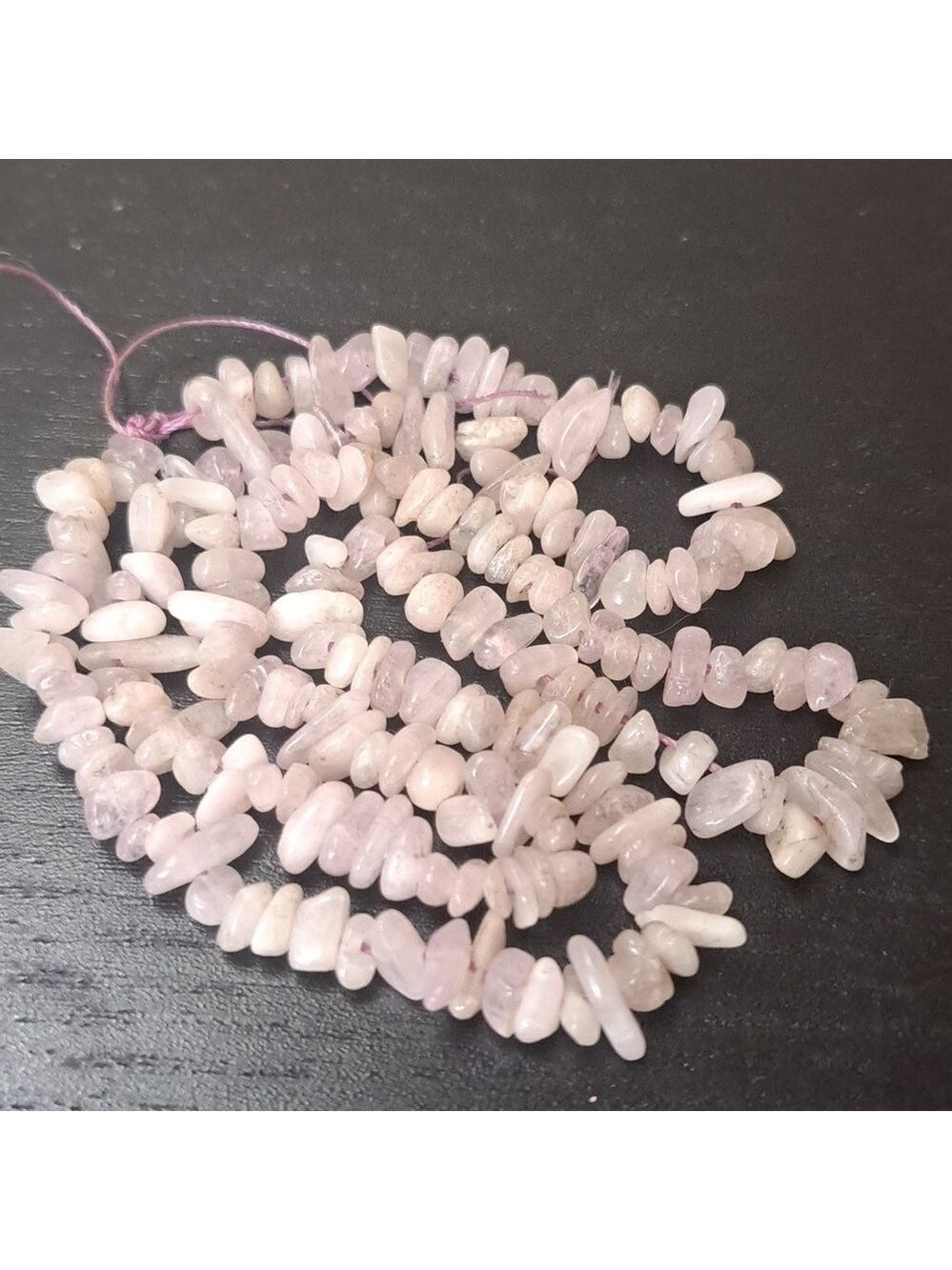String of polished Kunzite gemstone chips